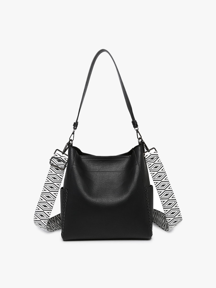 Black handbag with patterned straps on a white background