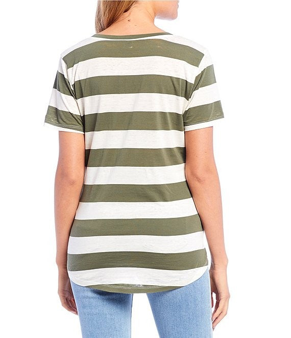 Person wearing a green and white striped t-shirt on a white background
