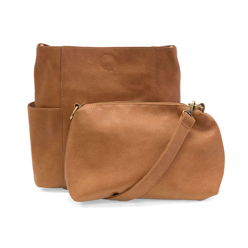 Brown leather crossbody bag on a white background
