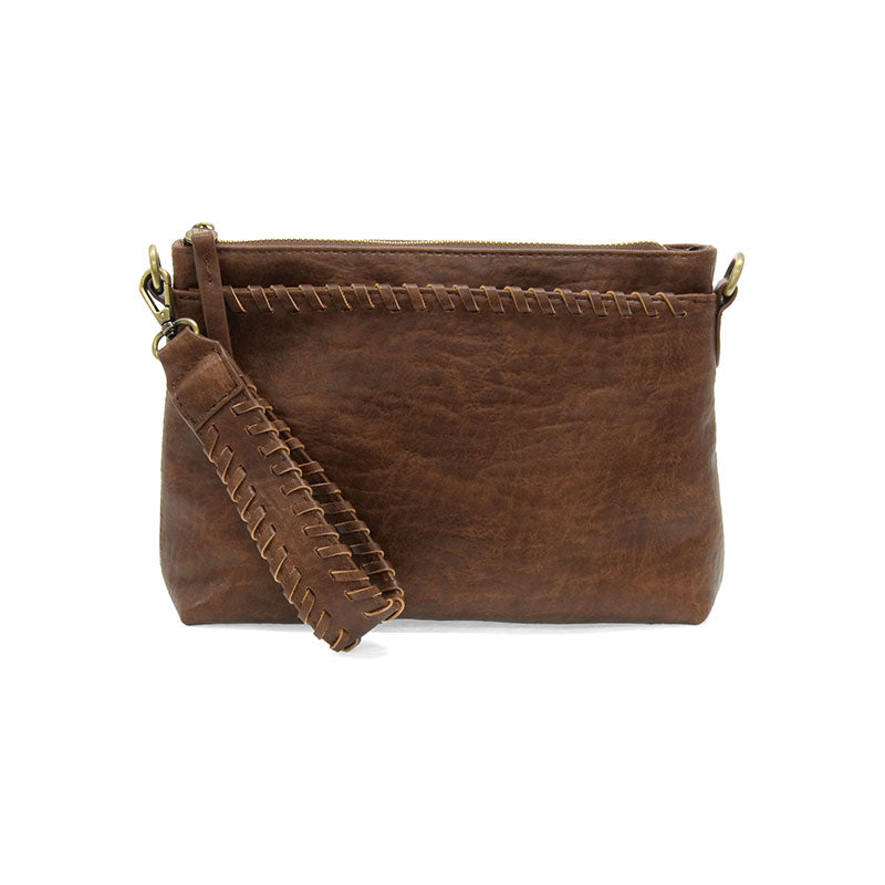 Brown leather clutch bag with a strap on a white background