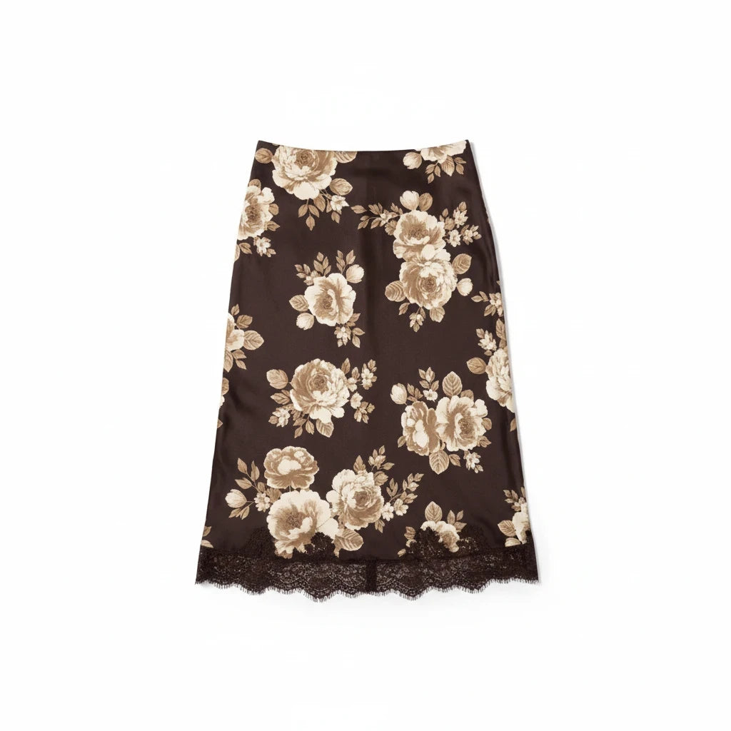 Apricot Lane Duluth Rosalie midi skirt in dark brown with cream floral print, bias-cut silhouette and lace trim hem.