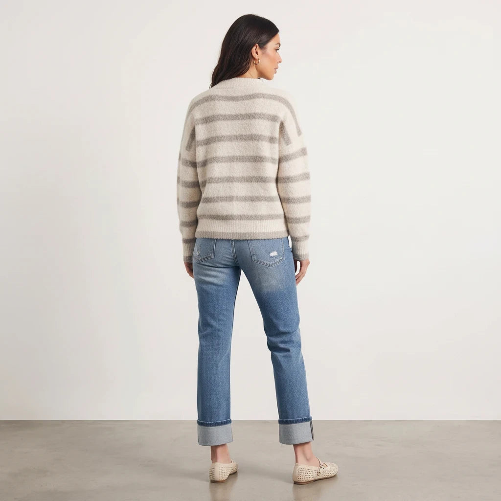 Apricot Lane Duluth Lila stripe fuzzy knit cardigan worn with blue jeans and loafers, back view