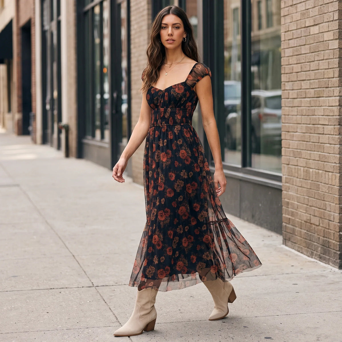 Model wearing Apricot Lane Duluth Rosalie floral organza midi dress with sweetheart neckline and shirred waist on street