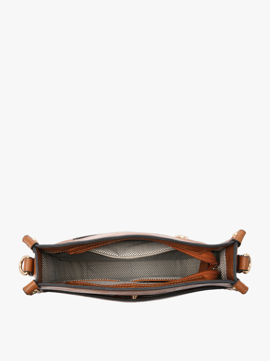 Brown leather bag with open interior on a white background