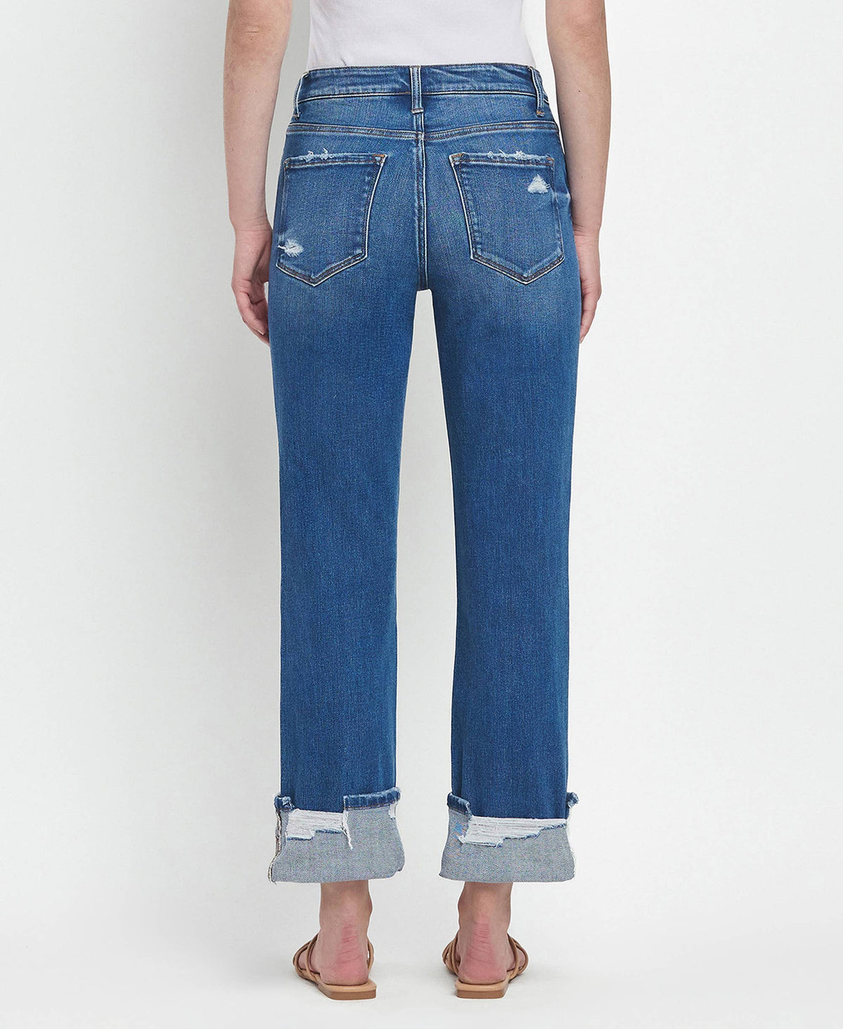 Blue jeans with a white background
