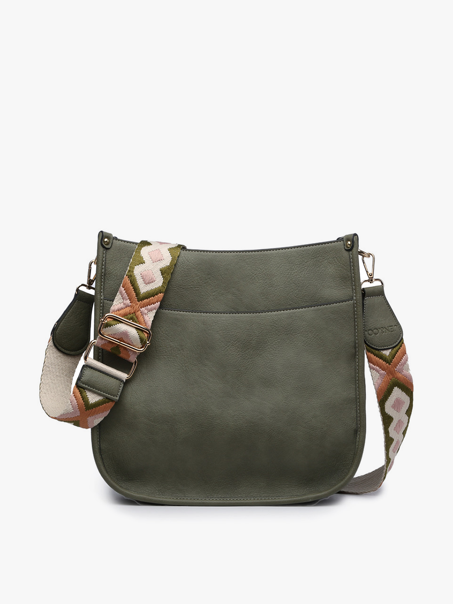 Green leather handbag with a floral strap on a white background