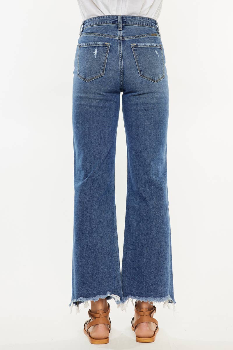 Blue jeans with a white background