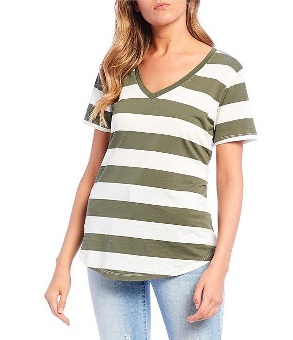 Person wearing a olive and white striped t-shirt on a white background