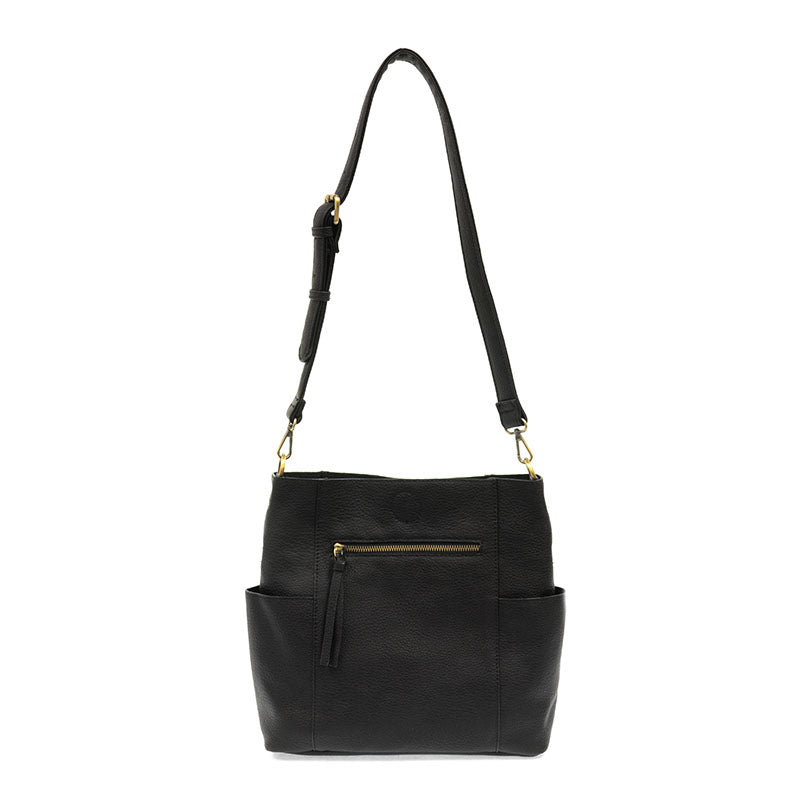 Black leather handbag with a strap on a white background