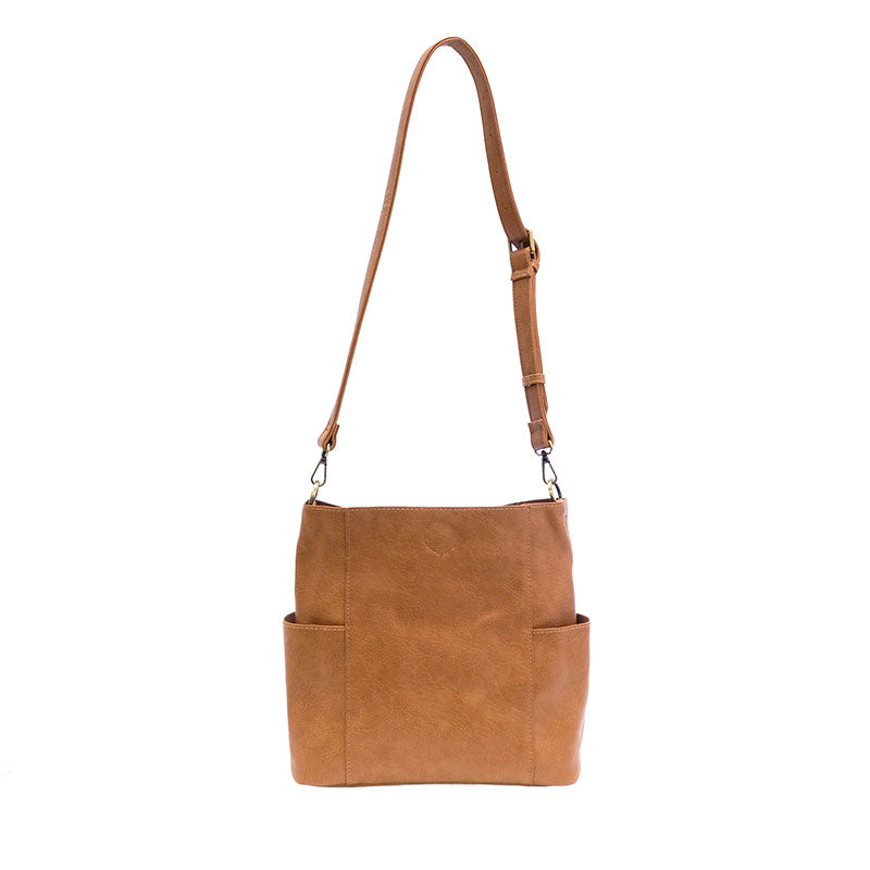 Brown leather shoulder bag with a strap on a white background