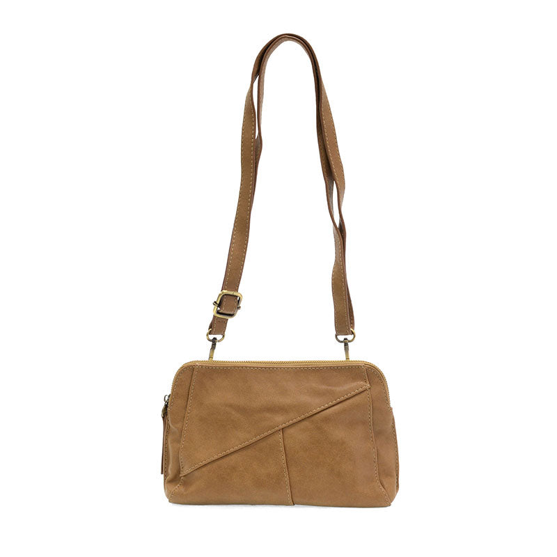 Brown leather handbag with a strap on a white background
