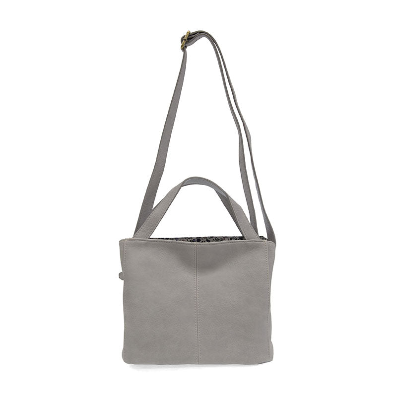 Gray shoulder bag with a strap on a white background