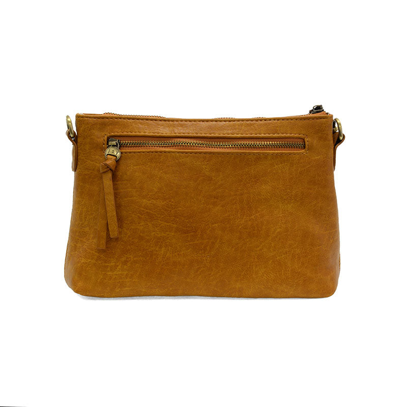Brown leather crossbody bag on a white background