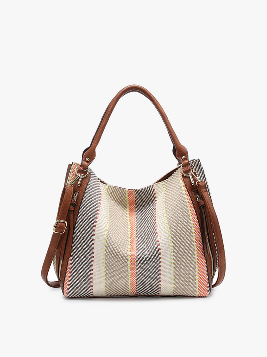 Handbag with plaid pattern and brown leather straps on a white background