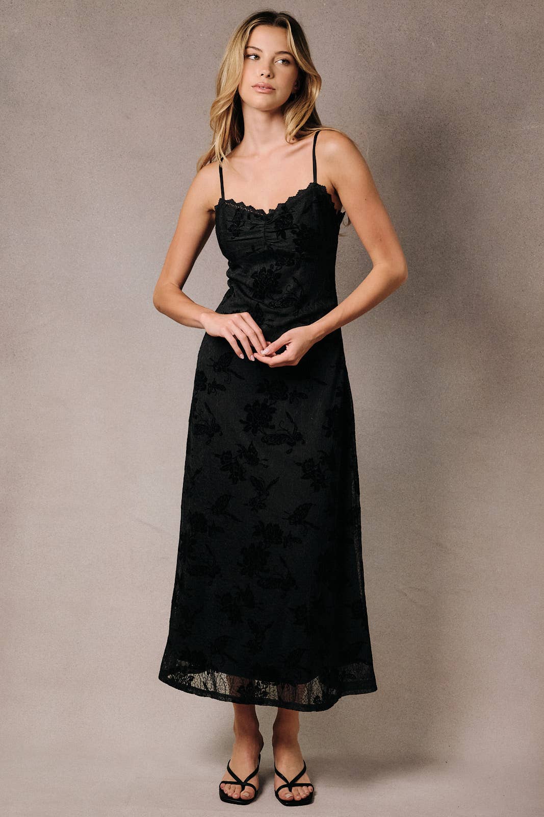 Apricot Lane Duluth Colette black midi slip dress with floral velvet burnout fabric and scalloped lace trim details.