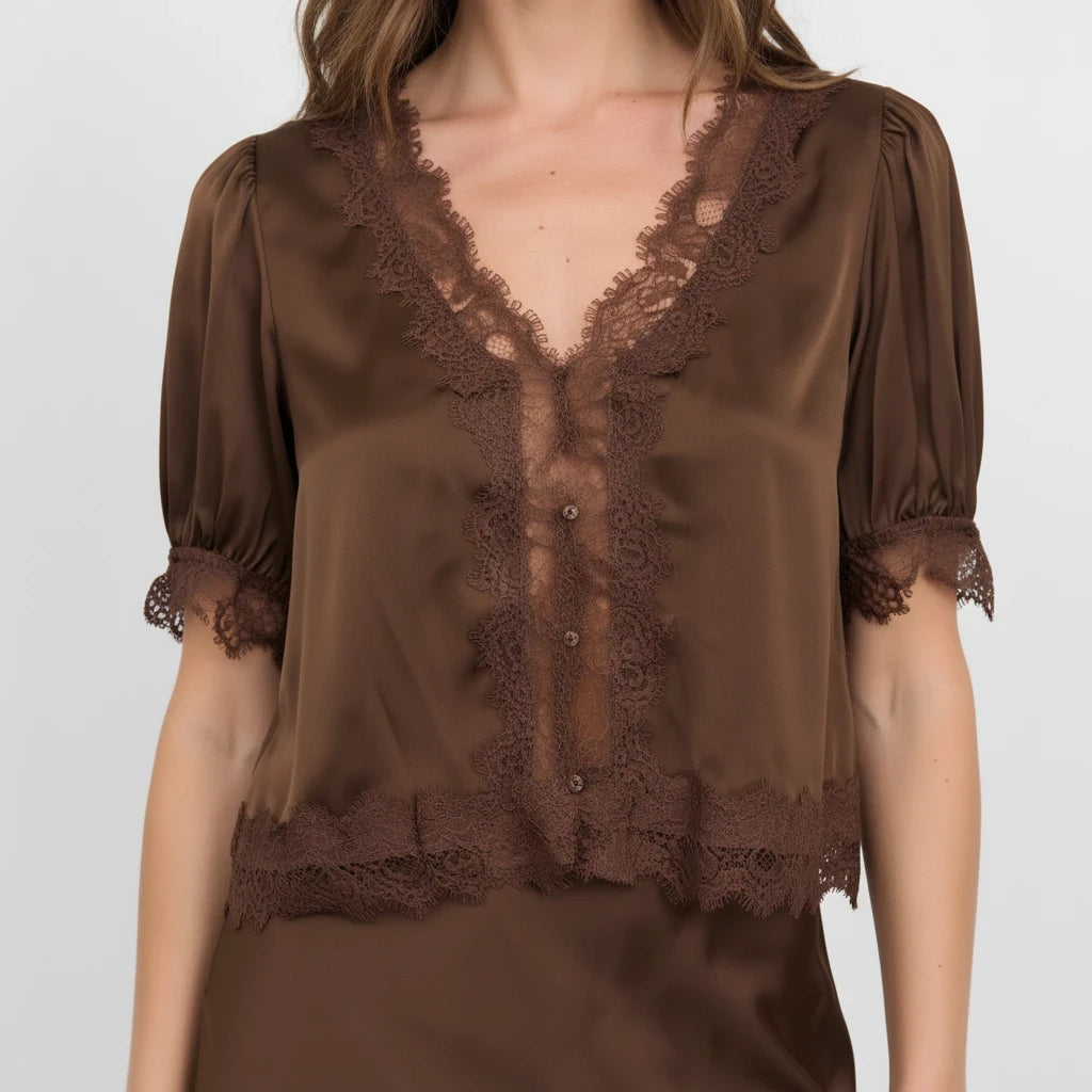 Apricot Lane Duluth brown satin blouse with delicate lace trim, V-neckline, and short puff sleeves.