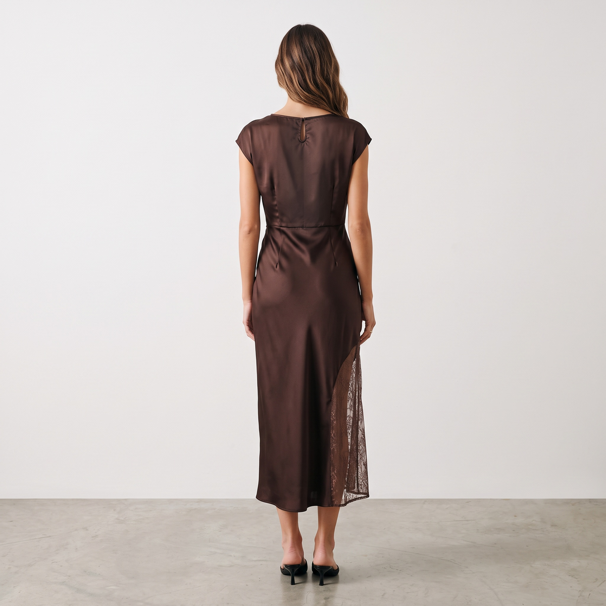 Back view of Apricot Lane Duluth brown satin midi dress with cap sleeves and sheer lace side panel detail