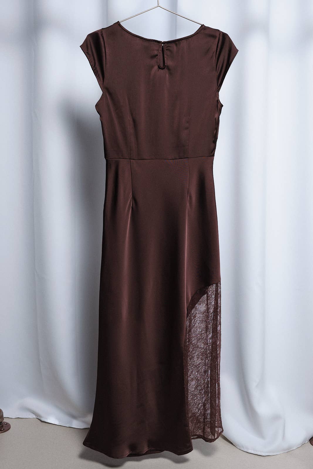 Apricot Lane Duluth brown satin midi dress with cap sleeves, boat neckline, and a sheer lace insert on the skirt.