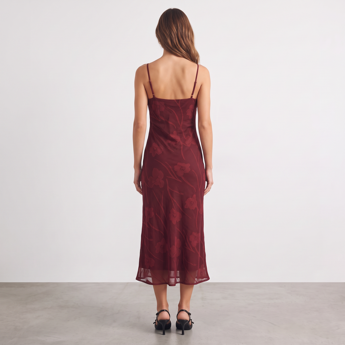 Apricot Lane Duluth burgundy midi slip dress with floral burnout texture, spaghetti straps, and back view.