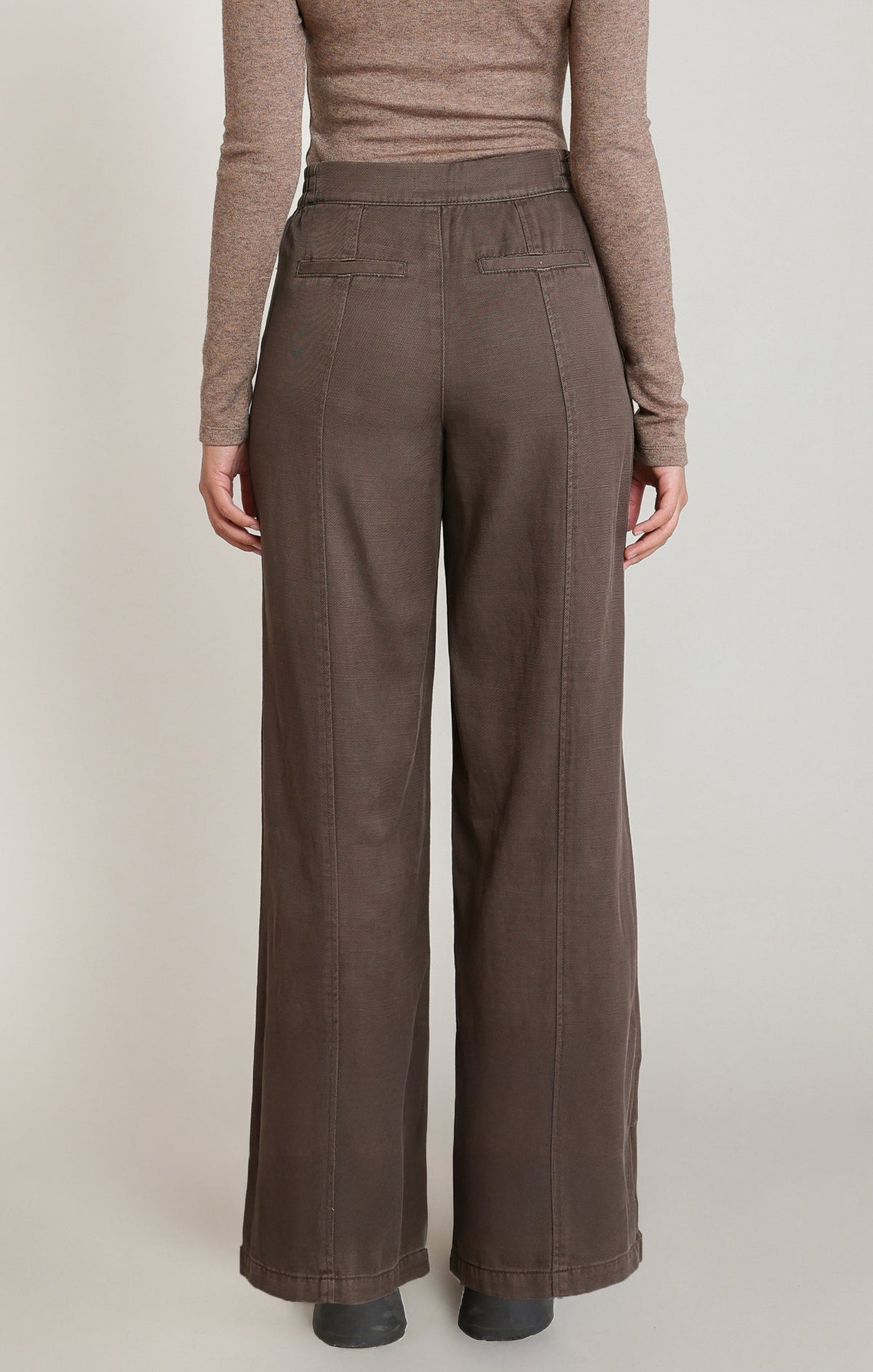 Back view of Apricot Lane Duluth Camilla wide-leg pants in brown cotton-Tencel twill with a high-waisted fit.
