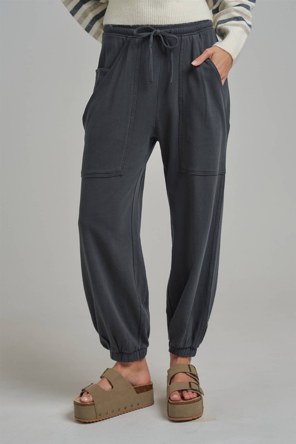 Apricot Lane Duluth Dakota cargo joggers in charcoal grey with an elastic drawstring waist and oversized pockets