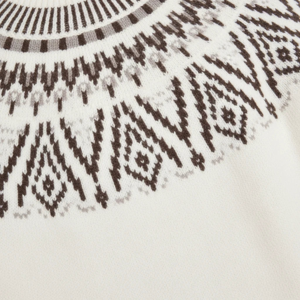 Apricot Lane Duluth Margot Fair Isle sweater featuring a cream wool-blend knit with a brown geometric jacquard yoke.