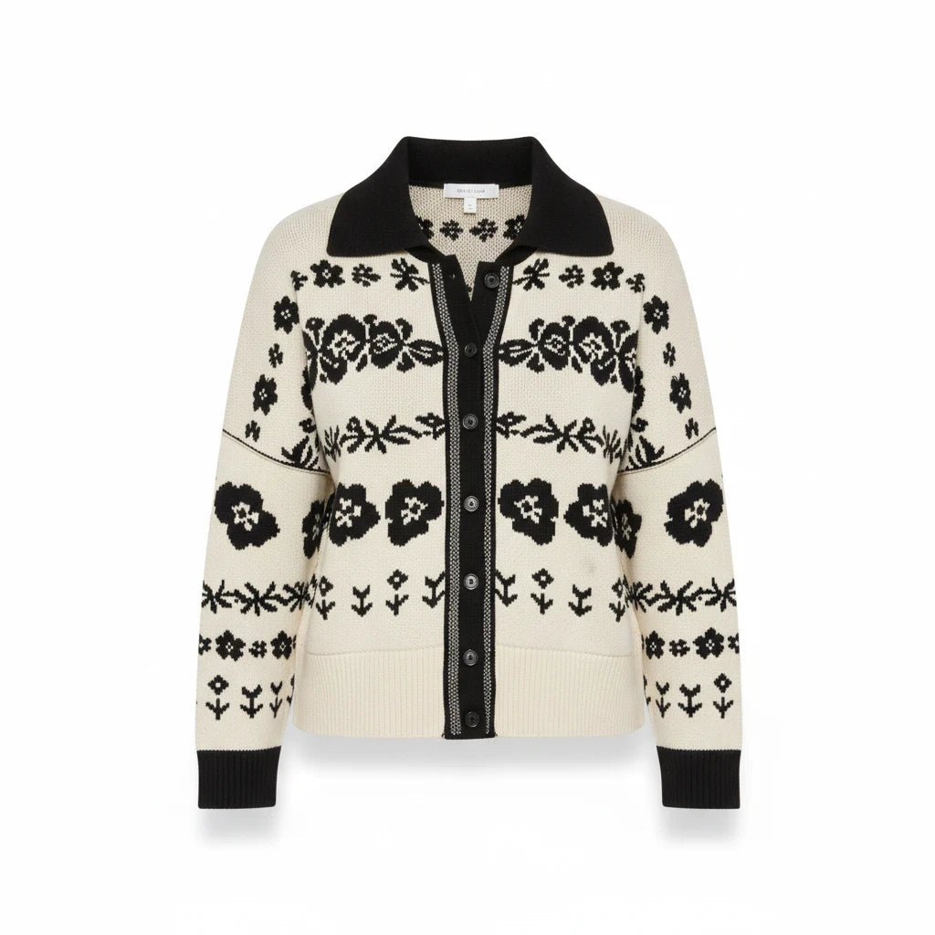 Apricot Lane Duluth Marlowe cardigan in cream with a black floral jacquard pattern, collar, and button-front closure.
