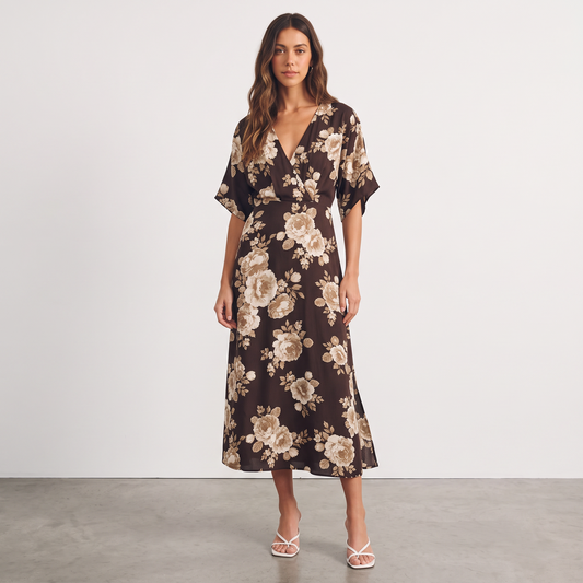 Model wearing Apricot Lane Duluth brown floral midi dress with kimono sleeves and surplice neckline.