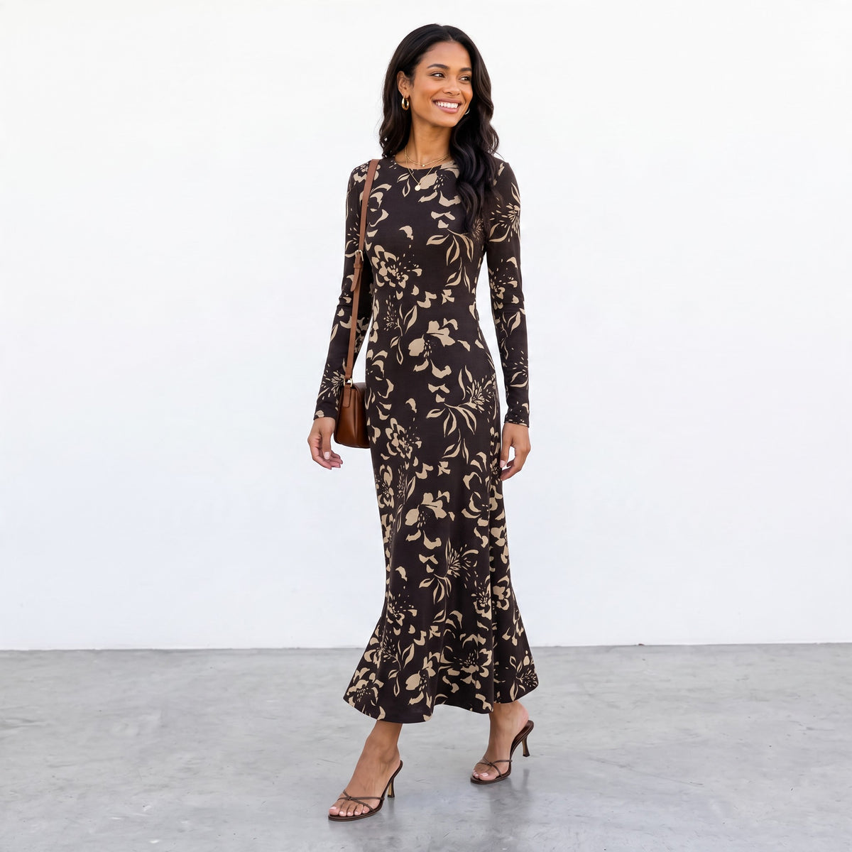 Model wearing Apricot Lane Duluth Lilian Freya floral midi dress in brown stretch jersey with long sleeves