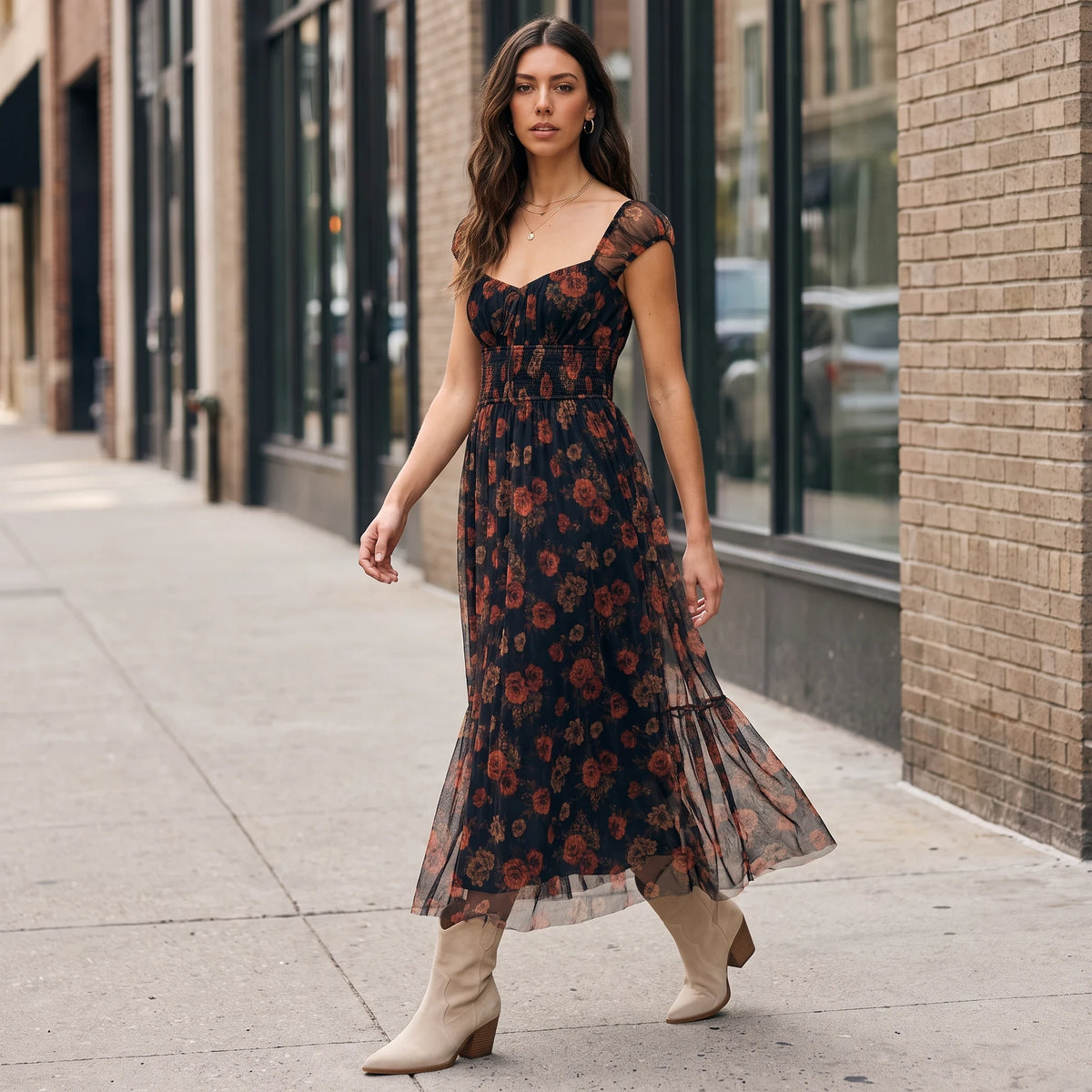 Model wearing Apricot Lane Duluth Rosalie floral organza midi dress with sweetheart neckline and shirred waist on street