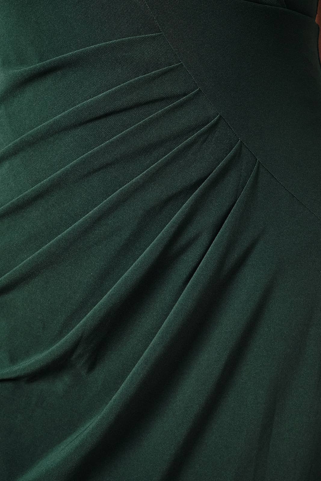 Apricot Lane Duluth Isabelle midi dress in dark green featuring elegant asymmetric pleated fabric detailing