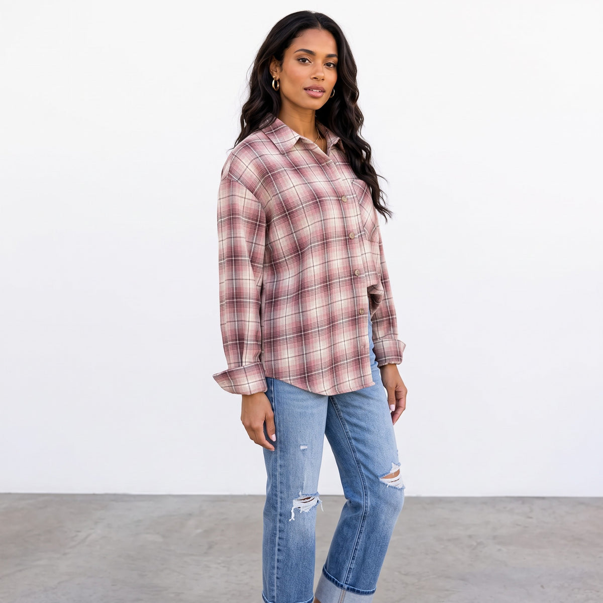 Apricot Lane Duluth Maren plaid button-down shirt in muted pink and brown worn with distressed blue jeans