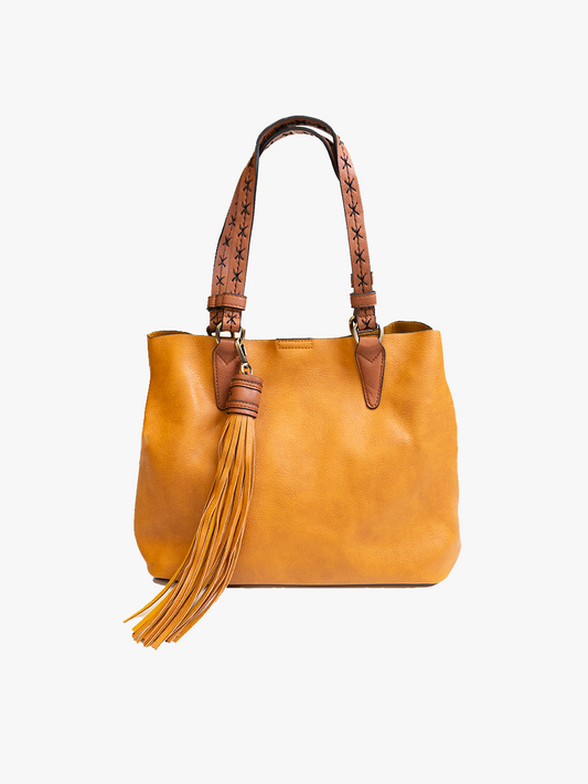 Brown leather handbag with a tassel on a white background
