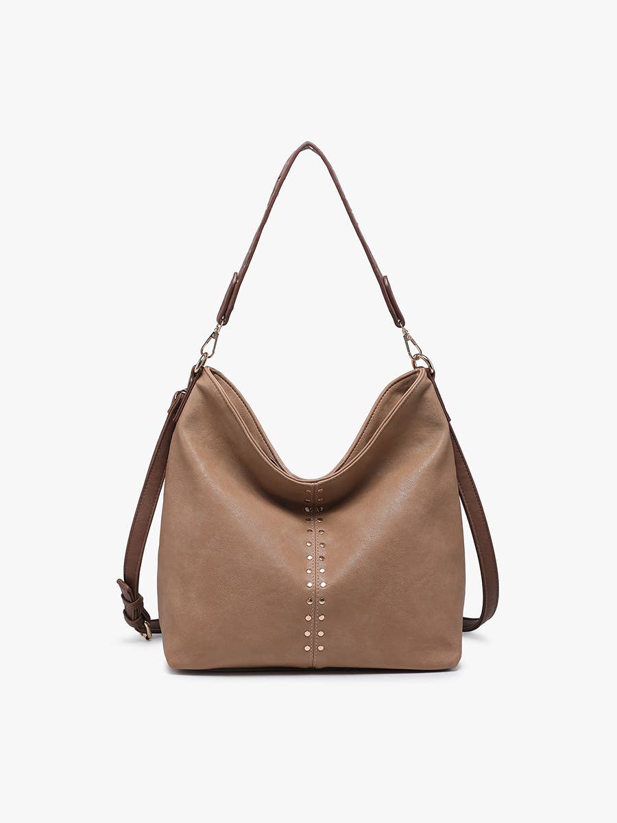 Brown leather handbag with studded details on a white background