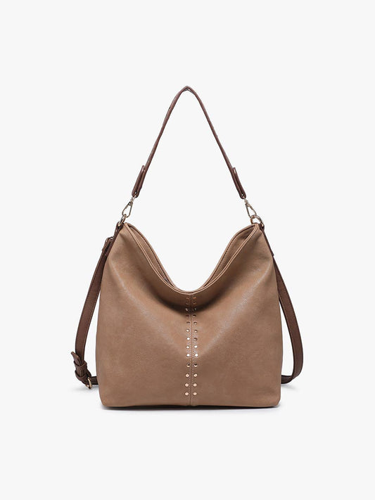 Brown leather handbag with studded details on a white background